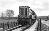 08710 near Prestonhall level crossing on a cold January day in 1990 with the Thornton - Tullis Russell trip freight. [See image 39870]<br><br>[Bill Roberton 26/01/1990]