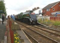 Saturday 4 August 2012 saw A4 <I>Union of South Africa</I> on the 'Cumbrian Mountain Express' heading east through Bamber Bridge with many on the platforms to watch it pass.<br><br>[John McIntyre 04/08/2012]