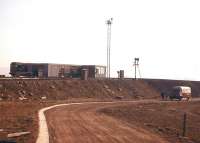 Almost a desert landscape, as a pickup van waits on 23rd February 1963 to collect railwaymen from the Hump Office at Millerhill Up Yard, which had opened in June 1962 and initially handled 2,000 wagons a day.<br><br>[Frank Spaven Collection (Courtesy David Spaven) 23/02/1963]