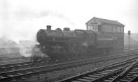 Ivatt 4MT 2-6-0 no 43139, photographed on a wet and miserable morning in December 1962 alongside Carlisle No 4 box. Allocated to Canal shed at that time, this locomotive (known locally as <I>Jezebel</I>) was a regular on the Langholm and Silloth trains. 43139 ended her days at Kingmoor, where she moved in June 1963 following closure of Canal shed. [See image 30631] <br><br>[K A Gray 22/12/1962]