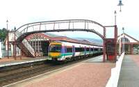 A morning Inverness - Glasgow Queen Street train at Aviemore in May 2002.<br><br>[John Furnevel 10/05/2002]