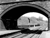 View north from platform 4 at Rotherham Masborough on a scorching hot day in May 1981. Holbeck <I>'Peak'</I> no 45073 has just run through platform 1 and passed below Midland Road bridge heading for Leeds with a train from Bristol.   <br><br>[John Furnevel 04/05/1981]