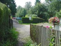 Just visible in the car park are the old platform edge stones at Symonds <br>
Yat (closed to passengers in 1959) on the former Ross and Monmouth Railway, photographed in August 2001.<br><br>[John Thorn 14/08/2001]