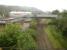 View over Neath & Brecon junction in August 2012 from a passing train on the South Wales main line. The former N & B line to Onllwyn Washery runs straight ahead with the remaining western section of the former Vale of Neath line to Cwmgrach branching off to the right.<br><br>[David Pesterfield 07/08/2012]