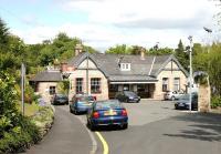 The road approach to Aberdour Station in May 2005. The building, which dates from 1890, is category B listed.<br><br>[John Furnevel 05/05/2005]