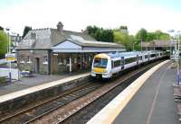 Platform view at Aberdour station looking south in May 2005 with a train leaving for Waverley.<br><br>[John Furnevel 05/05/2005]