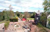 Barely recognisable New Galloway Station (Mossdale) in May 2002 looking east from the road bridge towards Castle Douglas. Part of the platform can be seen beyond the hedge in the left background. <br><br>[John Furnevel 30/05/2002]