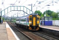 A mid-morning Edinburgh Waverley - Glasgow Central via Shotts train about to make a stop at Slateford in May 2005.<br><br>[John Furnevel 31/05/2005]