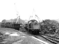 The former scrapyard of Messrs Henderson & Co alongside Airdrie station, photographed in September 1970. A number of withdrawn steam locomotives were broken up here [see image 53112]. Unfortunately the Clayton was just visiting.<br><br>[John Furnevel 05/09/1970]