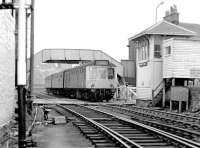 A Glasgow Central - Ardrossan Harbour DMU running over Princes Street level crossing in February 1972.<br><br>[John Furnevel 05/02/1972]