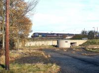 A GNER Kings Cross - Glasgow Central train passing through Wester Hailes station on the west side of Edinburgh on 22 November 2002.<br><br>[John Furnevel 22/11/2002]