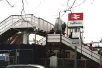 Some of the last passengers to use the original footbridge at Shettleston inspect the newly erected replacement as they cross from platforms 2 to 1 on 20th December 2011. [See image 2691] <br><br>[Colin McDonald 20/12/2011]