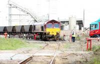 Empty coal hoppers being reversed over an internal level crossing into the loading area within Leith Docks on 29 June 2005.  The hoppers will be loaded with imported coal destined for Cockenzie power station.<br><br>[John Furnevel 29/06/2005]