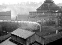 A class 37 approaching Gorgie Junction from the west with a cement train in April 1981.<br><br>[John Furnevel 14/04/1981]