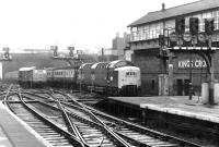 An unidentified Deltic brings an ECML service into Kings Cross in September 1974.<br><br>[John Furnevel 24/09/1974]