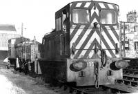 Barclay 0-4-0DM shunters D2413 and D2435 (nearest the camera) outside 64H Leith Central in 1970.<br><br>[John Furnevel 12/03/1970]