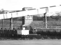Scene at Bilston Glen colliery in January 1971 with an unidentified diesel shunter supervising the loading of MGR coal hoppers. The coal would almost certainly be destined for Cockenzie power station.<br><br>[John Furnevel 22/01/1971]