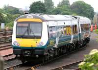 One of the Hull Trains class 170s, considered as possibilities for use on the North Berwick route, standing in the rain at Haymarket shed on 15 June 2005.<br><br>[John Furnevel 15/06/2005]