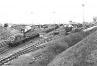 37083 preparing to leave Millerhill down yard in April 1980. Monktonhall Colliery stands in the right background. [See image 34402] <br><br>[John Furnevel 22/04/1980]