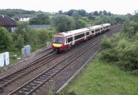 An Edinburgh Waverley - Glasgow Queen Street DMU just west of Greenhill lower Junction in June 2004.<br><br>[John Furnevel 15/06/2004]