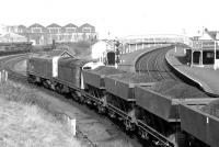 In April 1980 20115+20149 take the Ayr harbour branch at Newton Junction with a coal train from Killoch washery.<br><br>[John Furnevel 04/04/1980]