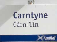 New ScotRail branding seen at Carntyne station on 14 May 2010, with the station name in Gaelic now added.<br><br>[John Yellowlees 14/05/2010]