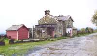 The road approach to Redmire in October 2004. The station had been closed to scheduled passenger traffic by BR in April 1954, although by this time it had become the western terminus of the Wensleydale Railway.<br><br>[John Furnevel 30/10/2004]