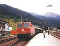 The Orient Express makes an extended stop at the Tyrolean town of St Anton in July 1997. The train would later continue on to Venice.<br><br>[John Furnevel 17/07/1997]