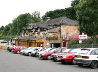 The road approach to Bearsden station on 10 July 2005. The former station building now houses <I>The Inn</I>. <br><br>[John Furnevel 10/07/2005]