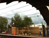 Start of work on the new footbridge at Shettleston on 1 September, seen from under the present rusting structure.<br><br>[Colin McDonald 01/09/2011]