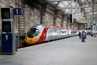 View from the concourse at Glasgow Central on 30 July 2005 with a Virgin Pendolino service for London, Euston, standing at platform 1.<br><br>[John Furnevel 30/07/2005]