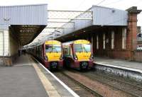 Platforms 1 and 2 at Paisley Gilmour Street, looking west in July 2005, with class 334s destined for Wemyss Bay (left) and Glasgow Central ready to depart.<br><br>[John Furnevel 30/07/2005]