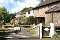 Entrance to old station at Norham in July 2005 - now a privately preserved museum.The platforms are on the embankment to the right. <br><br>[John Furnevel 05/07/2005]