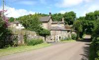 Norham - looking north - the remains of the bridge over the road can just be made out through the trees - this carried the line on to Velvet Hall, the next station east. (The next station west was Twizell!)<br><br>[John Furnevel 05/07/2005]