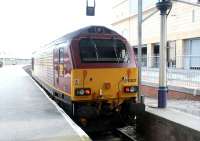 EWS 67027 stands at Inverness in May 2002 having worked in on the Sleeper.<br><br>[John Furnevel 01/05/2002]