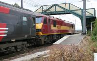 90039 is at the rear of a North Berwick train leaving Prestonpans station in July 2005.<br><br>[John Furnevel 15/07/2005]