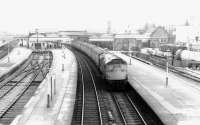 An unidentified type 2 takes a northbound train away from Stirling in May 1977.<br><br>[John Furnevel 04/05/1977]