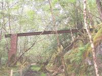 An aqueduct for diverting water away from the line. There are two of these. The state of the trackbed can also be seen.<br><br>[John Gray //]