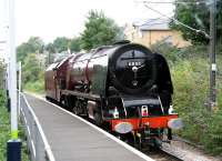 Was I surprised? Just a bit!!! ...6233 <i>Duchess of Sutherland</i>, in glorious crimson lake livery, passes west through Highbury and Islington station on the North London Line on 22 July 2005.<br><br>[John Furnevel 22/07/2005]