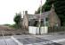 Remains of Halbeath station, Dunfermline, closed to passengers in 1930. View is west from the level crossing in June 2005 towards the sidings used for reversal by trains on the Hunterston-Longannet PS coal suppply route.<br><br>[John Furnevel 02/06/2005]