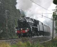 <I>K4 displaced</I>. After three weeks of LNER 3-cylinder chimney music from 61994 it was back to 2-cylinder LMS power for <I>The Fellsman</I> on 22 August. In yet another downpour 5MT 4-6-0 45305 steadily lifts the twelve coach train up the 1:98 out of Lancaster heading for Preston. Having made a trip to Blaenau Ffestiniog in the intervening week 61994 was back for the final summer <I>Fellsman</I> on 290812<br><br>[Mark Bartlett 22/08/2012]