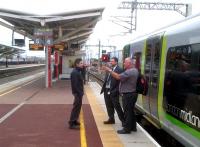 Morning rush hour at Rugby, with a down Pendolino on the left, and 66178 (centre distant) with an up container train, waiting patiently for the 07.02 for Euston via Northampton to clear platform 6.<br><br>[Ken Strachan 17/08/2012]