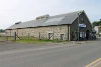 Exterior view of the well maintained trainshed at Wick in July 2012. This is a longer structure than the similarly styled building at Thurso.<br><br>[Mark Bartlett 06/07/2012]