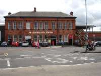 Frontage of Lichfield City station main building and street level station entrance on 31 July 2012. The platform level west end canopy is visible to the right of the building. [See image 38906] <br><br>[David Pesterfield 31/07/2012]