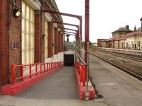 Canopy supports now in place over the subway ramp leading to island platforms 2 & 3 at Wakefield Kirkgate on 26 August 2012. The new part-glazed west end canopy on platform 1 can be seen across the tracks.<br><br>[David Pesterfield 26/08/2012]