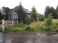 On a very wet August day the progress of the undergrowth in enveloping Carron Station is clear. Rate of growth over the past 3 years is suprising! Taken from the site of the level crossing in August 2012, looking north towards Aberlour.<br><br>[Brian Taylor 25/08/2012]