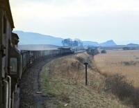 The EURS brake van trip from Ladybank to Perth on 3 March 1971 behind EE Type 4 No. D367 passing Lindores Loch on the approach to Newburgh. The distinctive building above the locomotive is Abdie and Dunbog Church. [With thanks to Messrs Leiper, Brown and Gall]<br><br>[Bill Jamieson 03/03/1971]