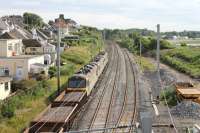 The Class 92 test train, which created lots of interest on the WCML in July 2012, is seen heading south at Hest Bank. On this occasion 92019 is in charge with 92027 and 92025 dead in train and a rake of loaded ballast wagons. The locos had all been in store for some time but all returned to regular traffic shortly after this date.<br><br>[Mark Bartlett 18/07/2012]