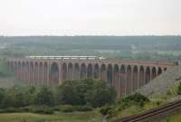 The 0755 Inverness to Kings Cross HST crossing the Culloden visaduct over the River Nairn, shortly after leaving the Highland capital on its long journey south. <br><br>[Mark Bartlett 04/07/2012]