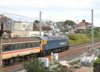 Former Advenza Freight No. 57006 is seen here bringing up the rear of a test train at Hest Bank on a circuit from Carnforth with newly repaired A4 4-6-2 No. 60009 on 18 July 2012. The Class 57 is now with West Coast Railways and had only recently returned to service itself. Within ten days of this picture being taken it had also been fully repainted into West Coast maroon livery [See image 39753].<br><br>[Mark Bartlett 18/07/2012]